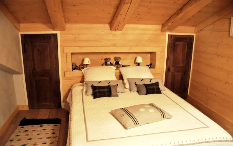 Chambre sous charpente bois